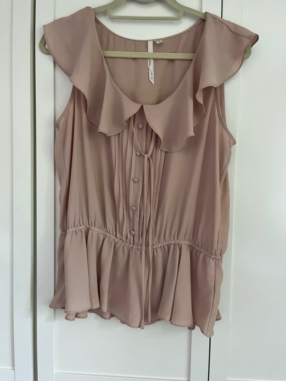 Bellatrix Sleeveless Ruffle Button-Front Blouse in Dusty Rose